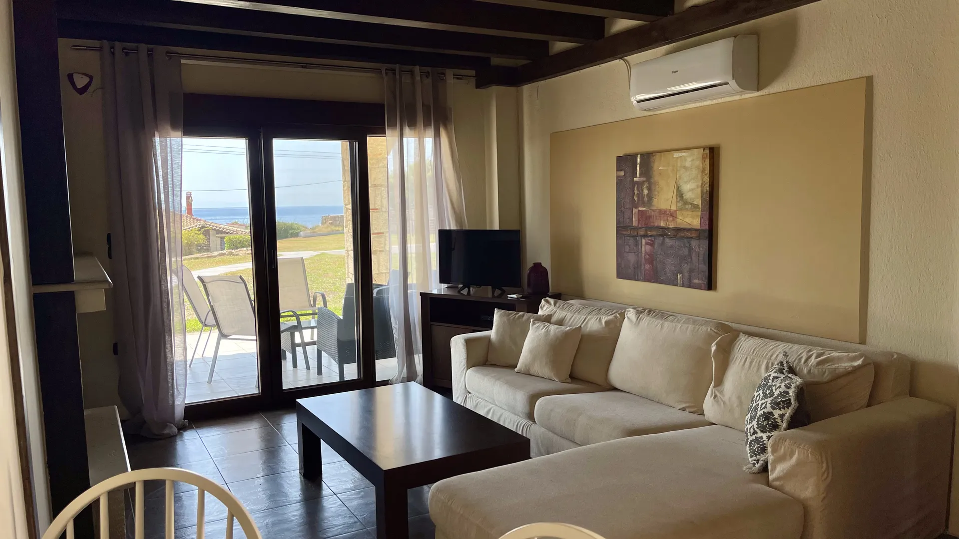 Tiara Holidays - Evlogia Village by Greek Pride - 2 bedroom - living room